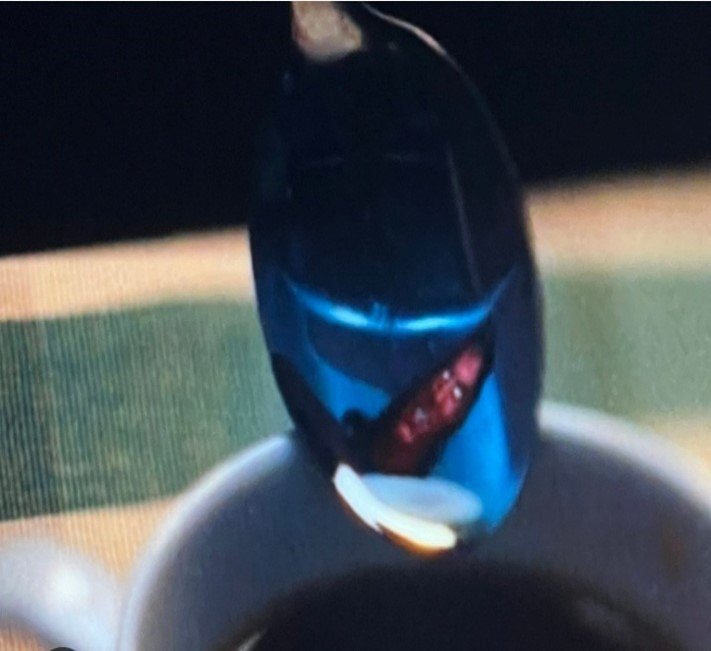 image of demon in reflection