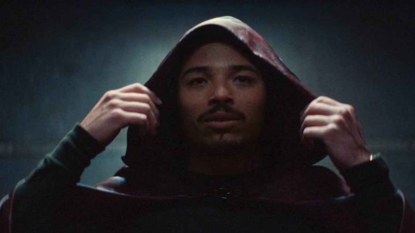 a man in a hoodie with a hoodie on